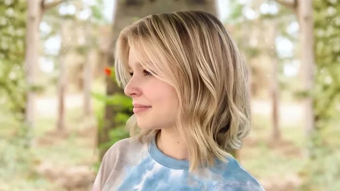 Client with soft blonde French balayage and sun-kissed highlights styled at Salon Lola in Gilbert, Arizona