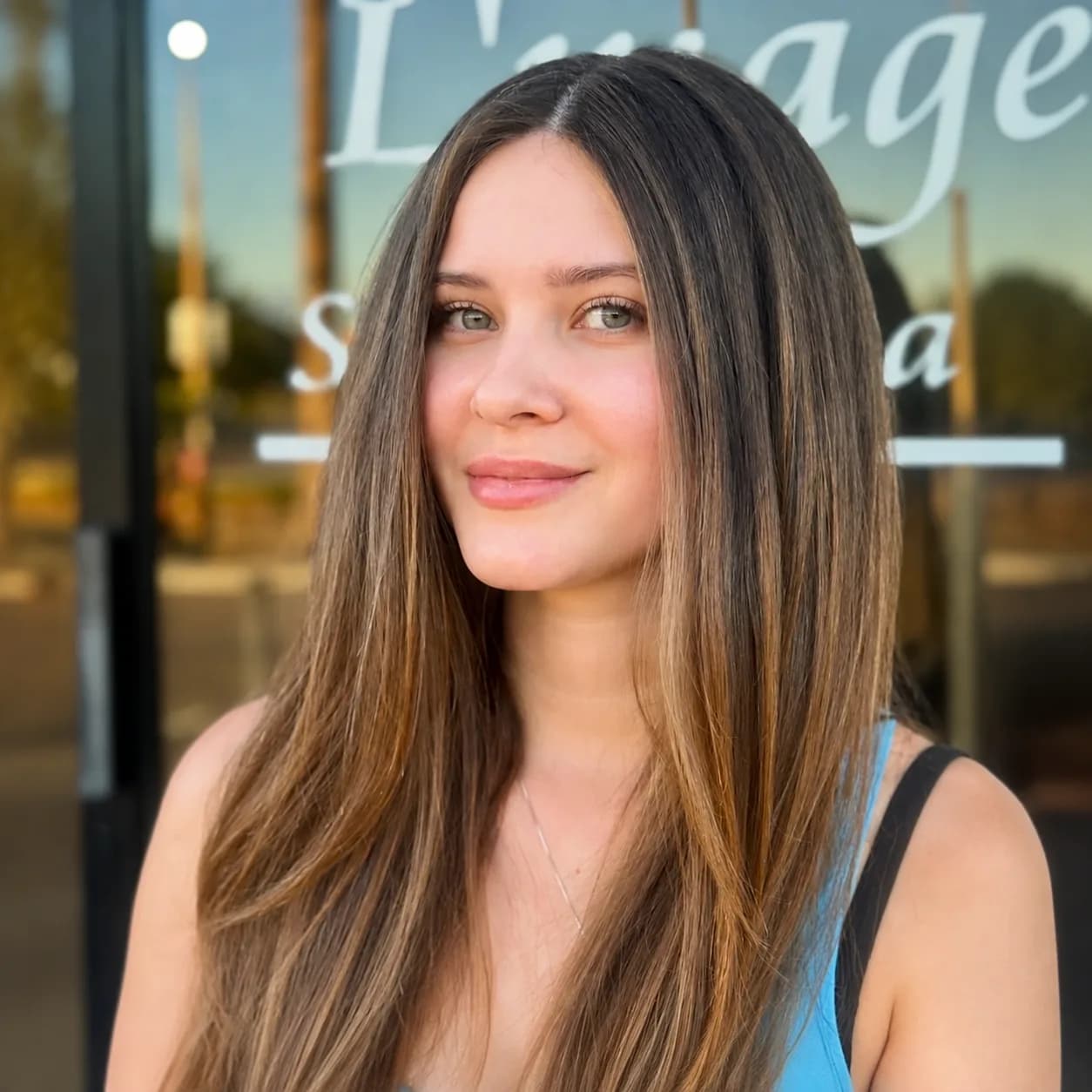 Natural-looking balayage color with soft blended highlights at Salon Lola in Gilbert, Arizona