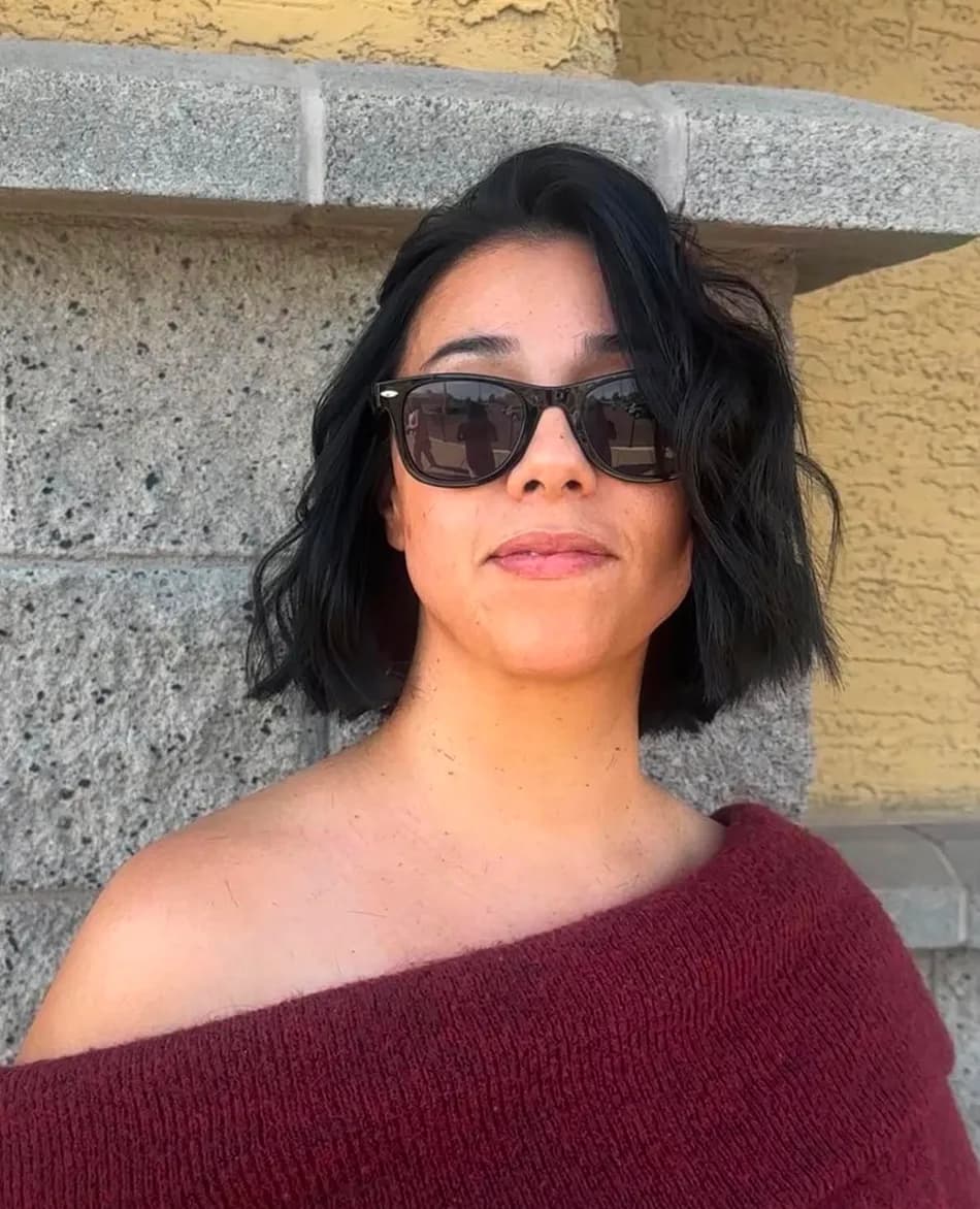 Chin-length wavy bob with voluminous heat-styled blowout finish at Salon Lola in Gilbert, Arizona